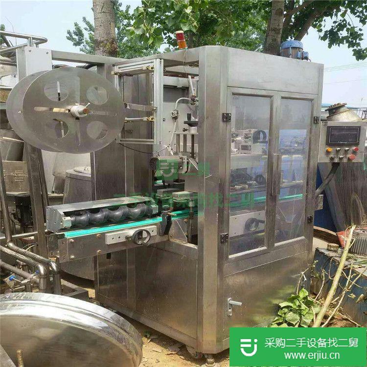 出售二手飲料套標機
