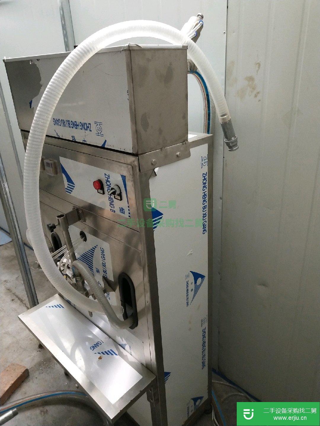出售二手半自動液體罐裝機