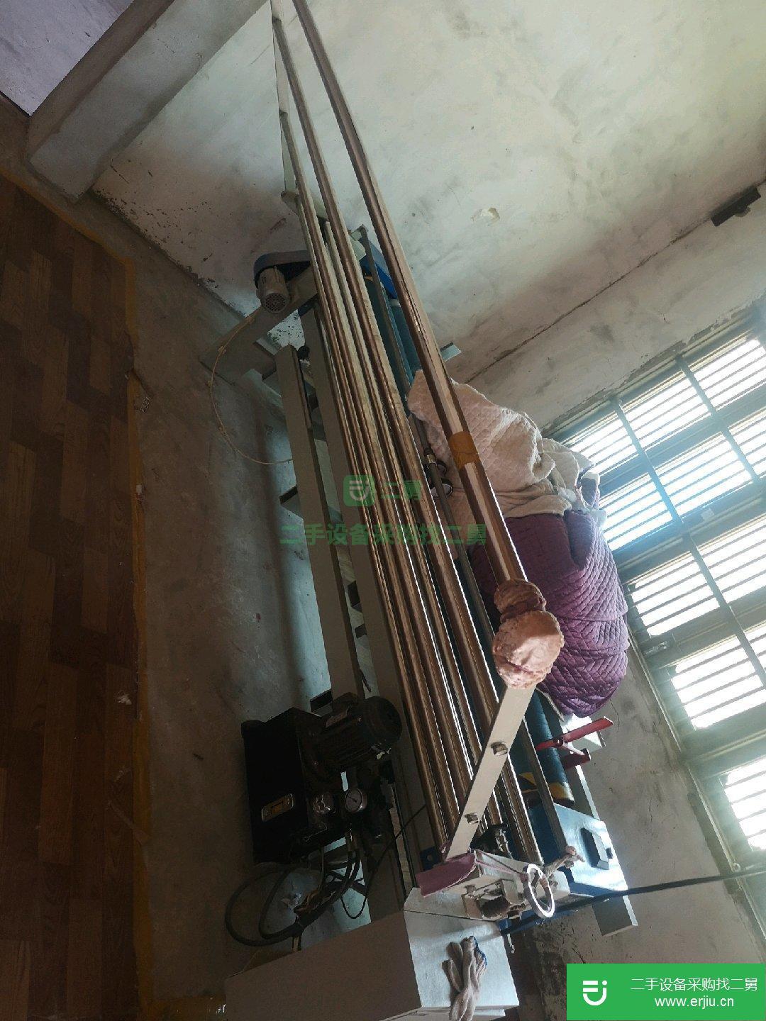 出售二手的9成新自動卷布機