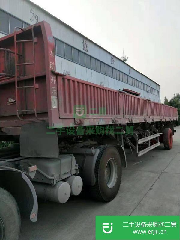 轉(zhuǎn)讓剛到家一臺二手12米標(biāo)箱側(cè)翻半掛自卸車