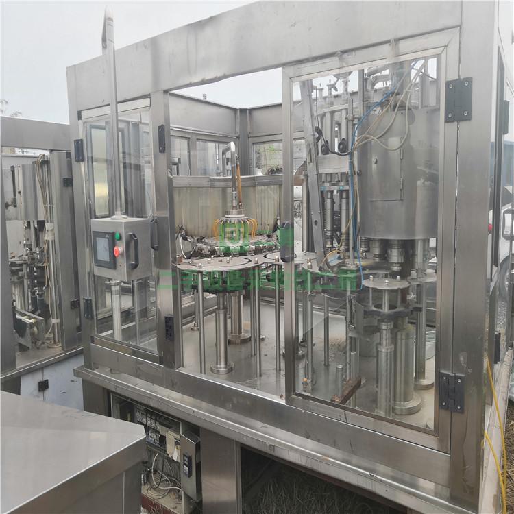 出售九成新二手沖灌封三合一機 全自動三合一灌裝機 果汁飲料灌裝機