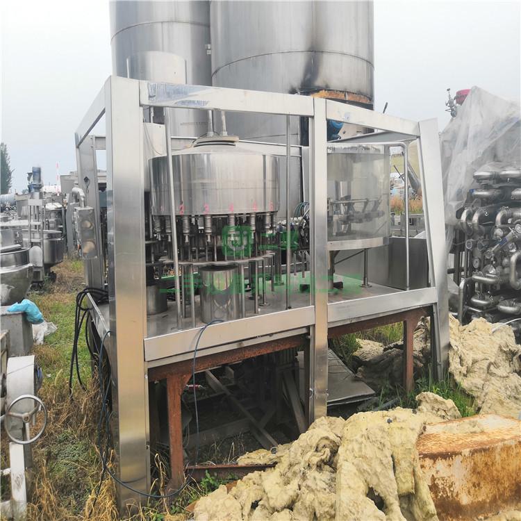 出售九成新二手沖灌封三合一機 全自動三合一灌裝機 果汁飲料灌裝機
