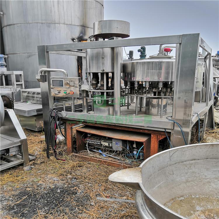 出售九成新二手沖灌封三合一機 全自動三合一灌裝機 果汁飲料灌裝機
