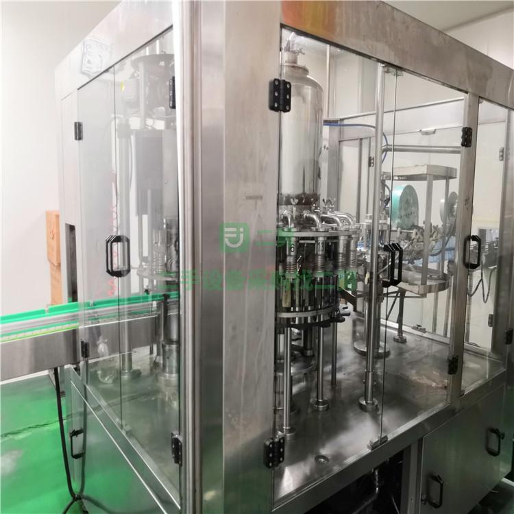 出售九成新二手沖灌封三合一機 全自動三合一灌裝機 果汁飲料灌裝機