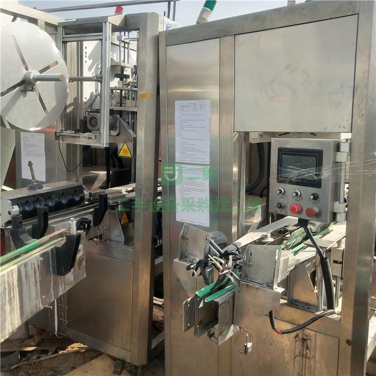 出售全自動套標機二手果汁飲料套標機二手礦泉水套標機熱收縮套標