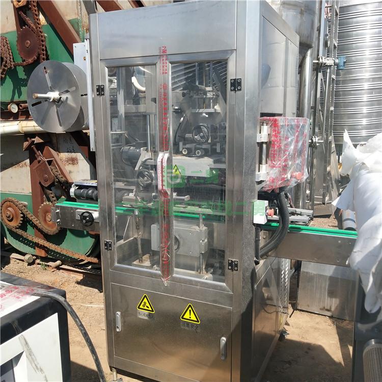 出售全自動套標機二手果汁飲料套標機二手礦泉水套標機熱收縮套標