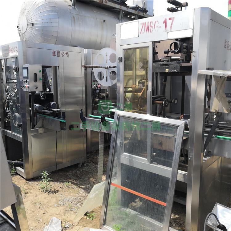 出售全自動套標機二手果汁飲料套標機二手礦泉水套標機熱收縮套標