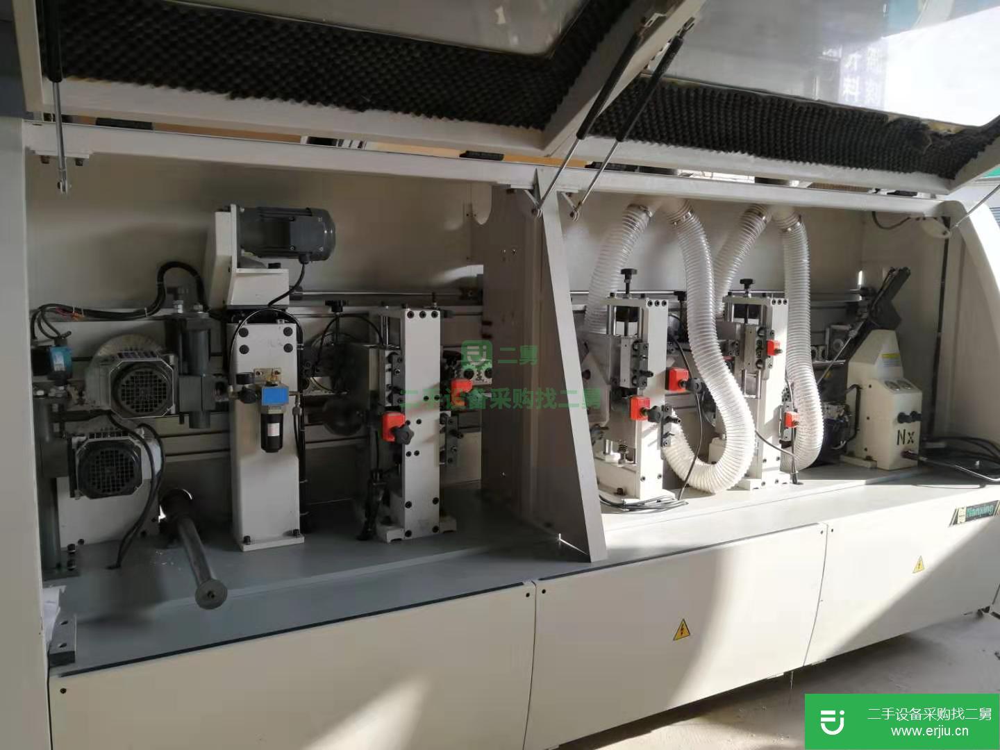 低價出售二手南興、極東全自動封邊機，二手四工序開料機、加工中心等