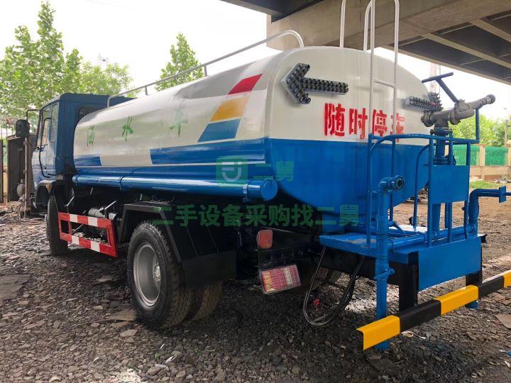 出售東風(fēng)145/10方原裝灑水車，康明斯六缸發(fā)動(dòng)機(jī)空調(diào)特別涼