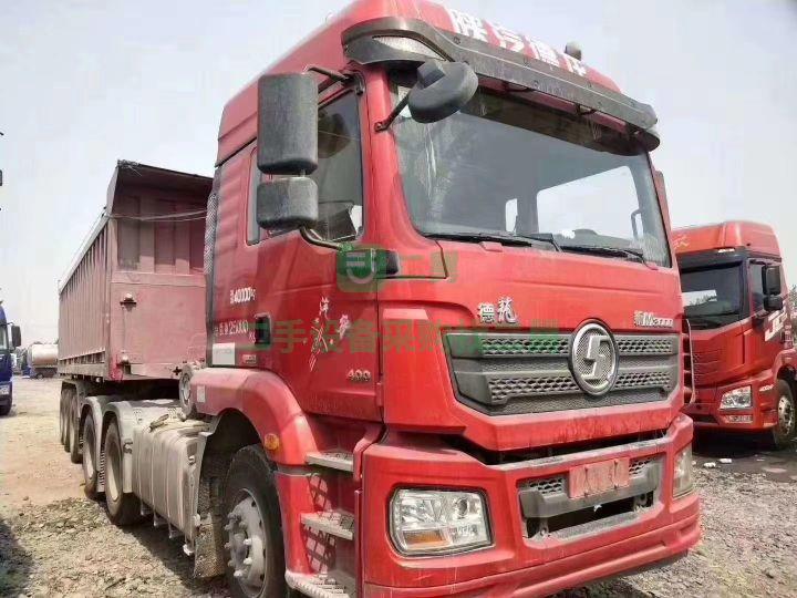 出售18年德龍M3000雙驅輕體430馬力帶8.5米平板后翻自卸牽引車