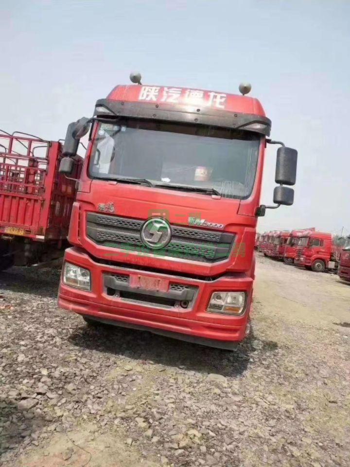 出售18年德龍M3000雙驅輕體430馬力帶8.5米平板后翻自卸牽引車
