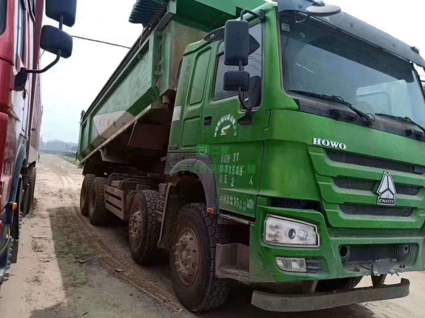 出售七臺18年6月國五豪沃前四后八自卸車，大箱6.8米，箱高1.5米，法規環保綠，首付6萬