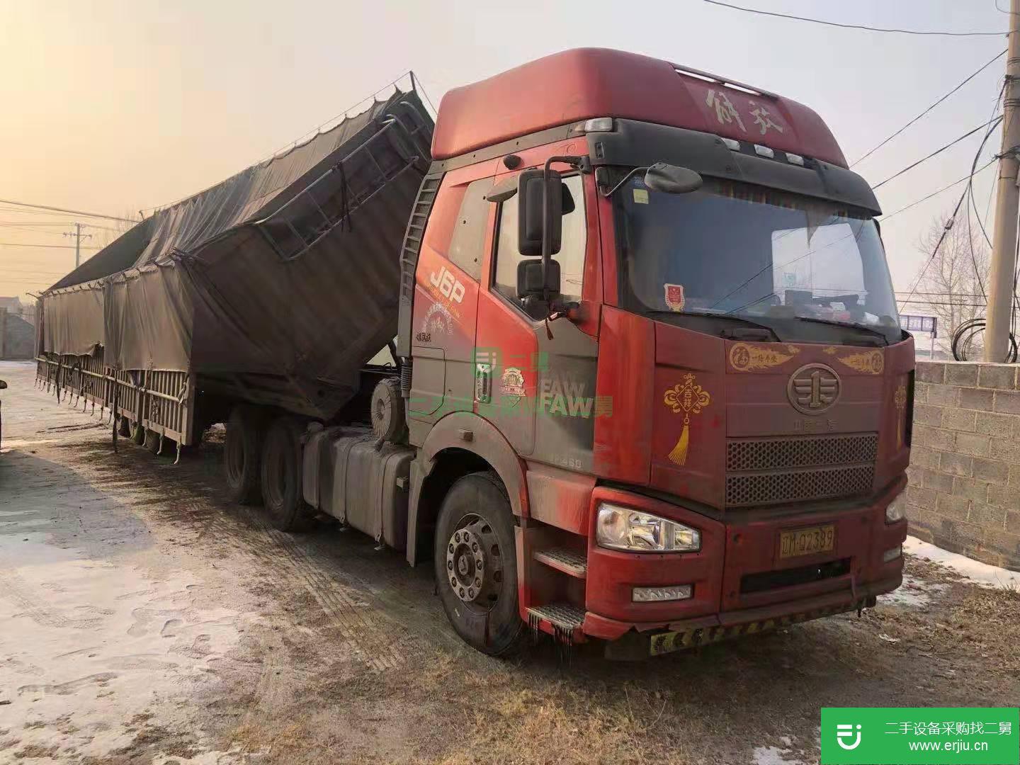 遼寧低價出售一汽解放J6M準重卡牽引車帶一臺側翻半掛車