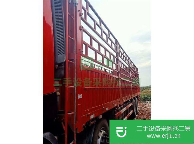 江西出售二手東風(fēng)天龍9.4米高欄載貨車