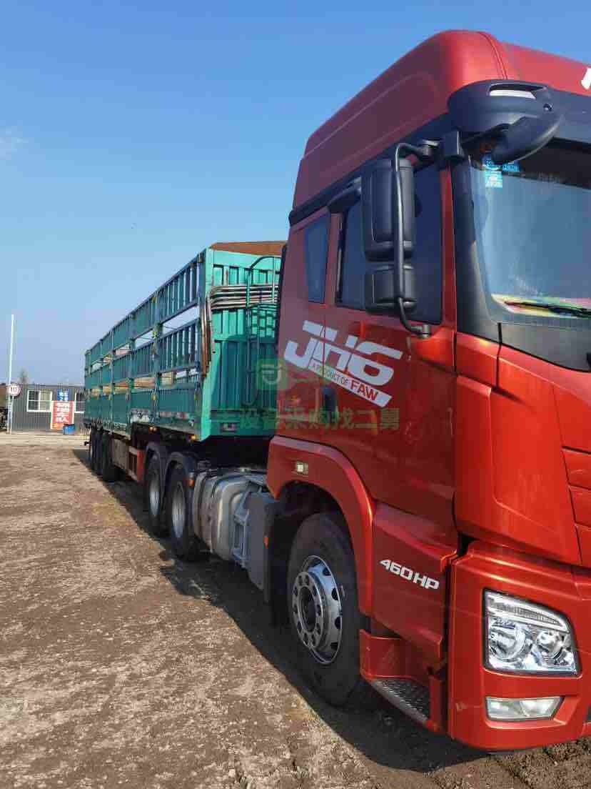 出售全保險解放JH6.460馬力雙驅牽引車，帶13米高低板下翻門掛車