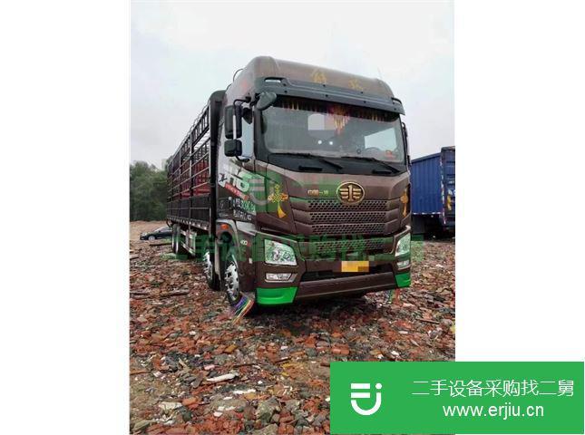 江西出售二手青島解放JH6重卡400馬力9.5米倉柵載貨車