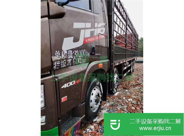 江西出售二手青島解放JH6重卡400馬力9.5米倉柵載貨車