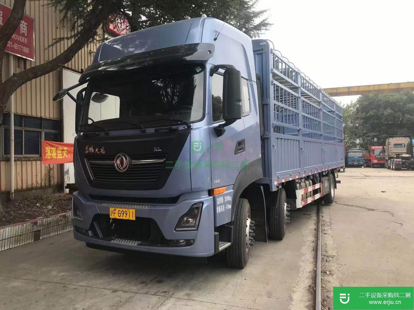 上海出售二手東風(fēng)天龍300馬力國(guó)五倉(cāng)柵式載貨車