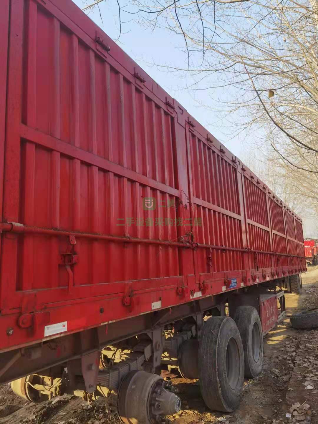 出售一臺13×2.55米平板側翻半掛車 車況九成新