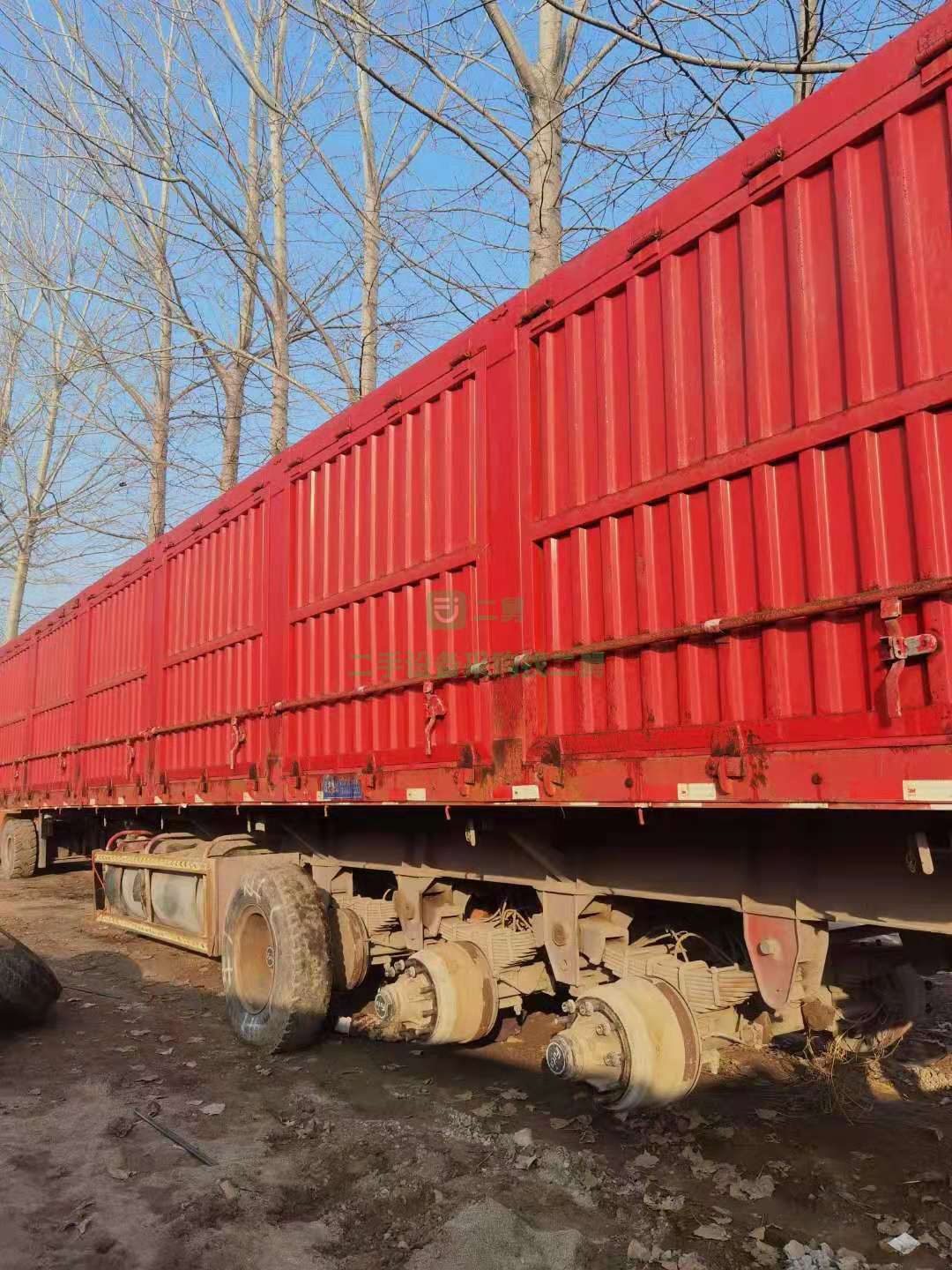 出售一臺13×2.55米平板側翻半掛車 車況九成新