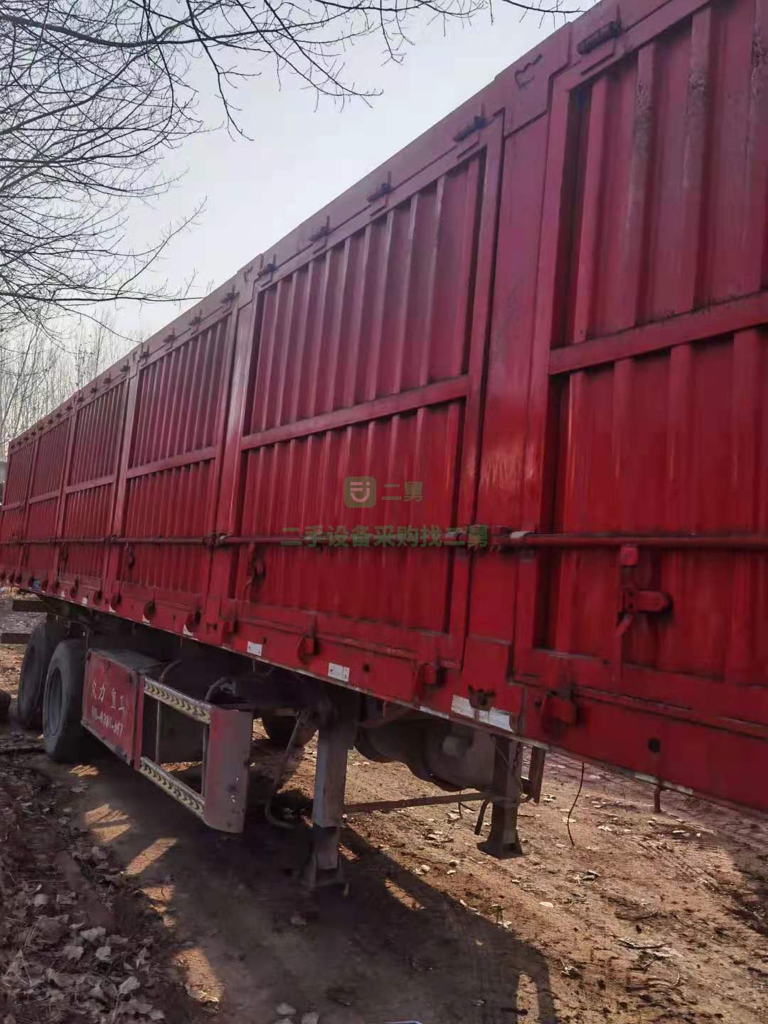 出售一臺13×2.55米平板側翻半掛車 車況九成新
