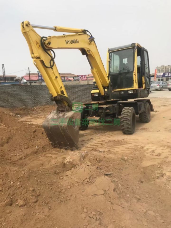 河北出售二手八成新的現(xiàn)代60－9輪挖掘機(jī)
