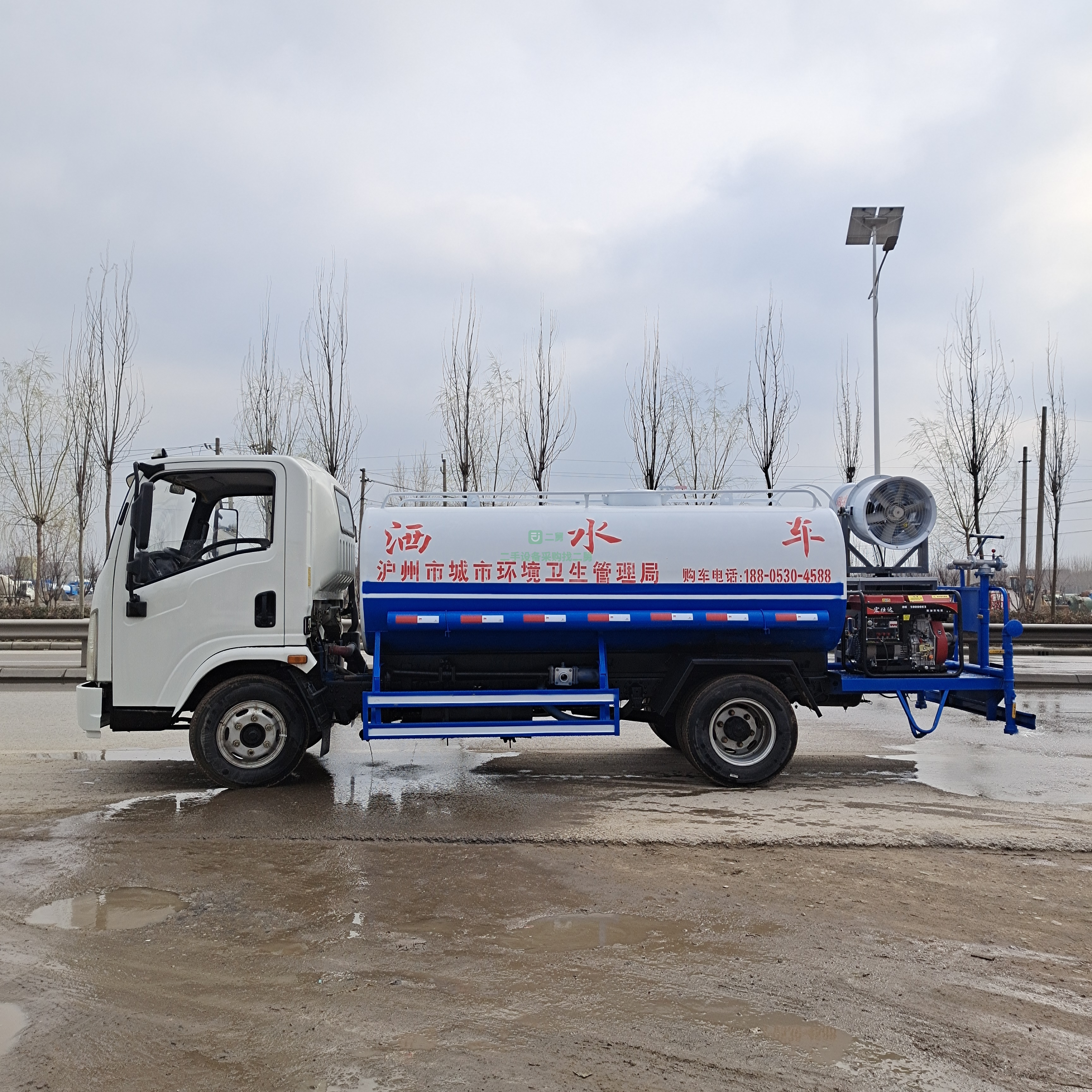 出售東風庫存全新5立方灑水車，發動機安徽徽柴490
