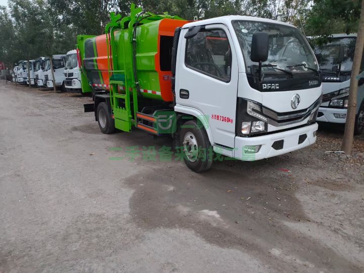 出售東風國六側裝壓縮垃圾車液壓后門