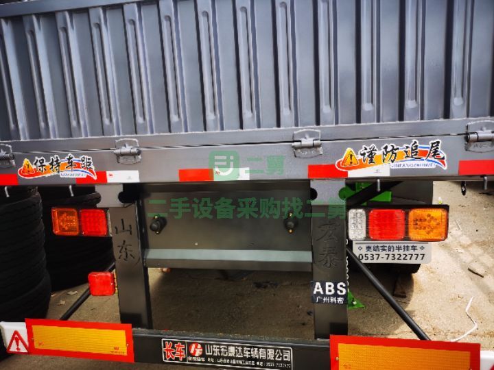 出售21年的13米半掛側翻自卸車