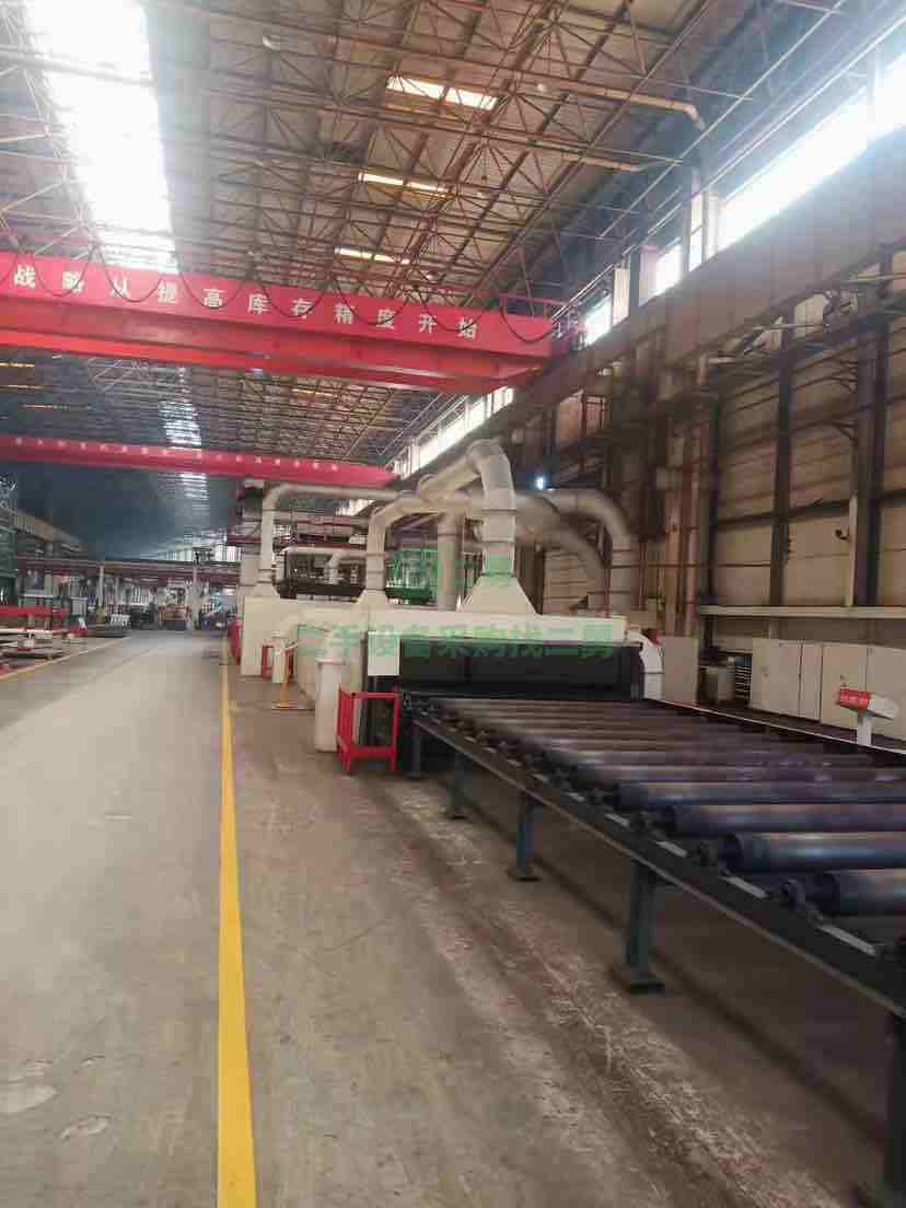 出售Q6925鋼板拋丸機(jī)在位，成色如圖，帶噴漆烘干
