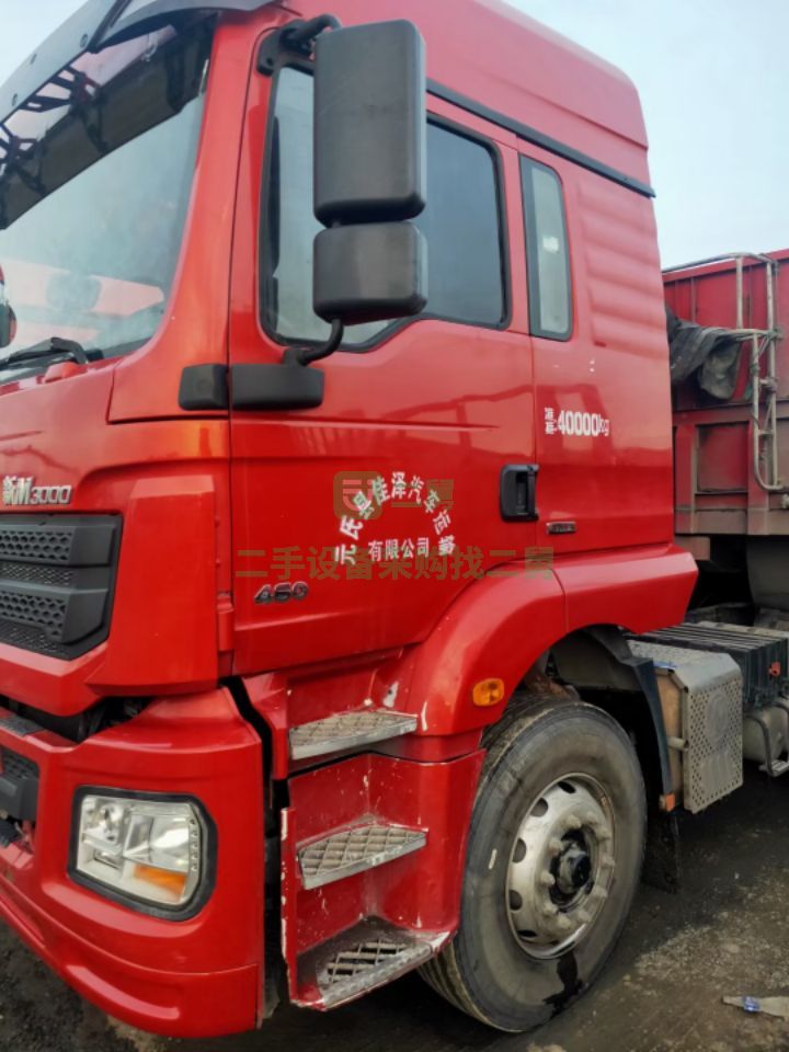 出售兩年五個月德龍M3000/460馬力帶13米60標箱側翻掛車牽引車